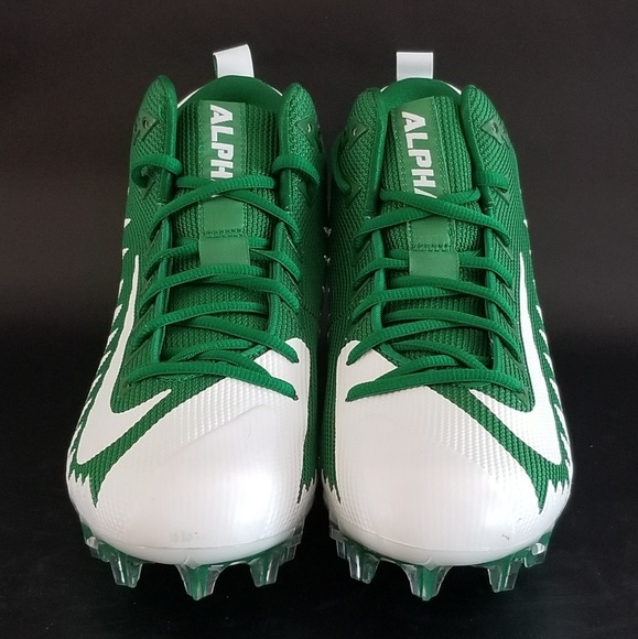 green and white football cleats